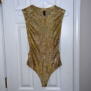 Brand new gold bodysuit